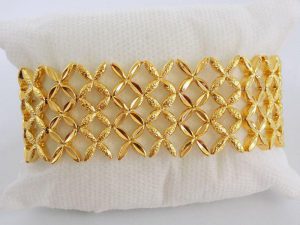دستبند زنانه طرح طلا عریض ژوپینگ شبکه ای ds-n114 از نمای بسته
